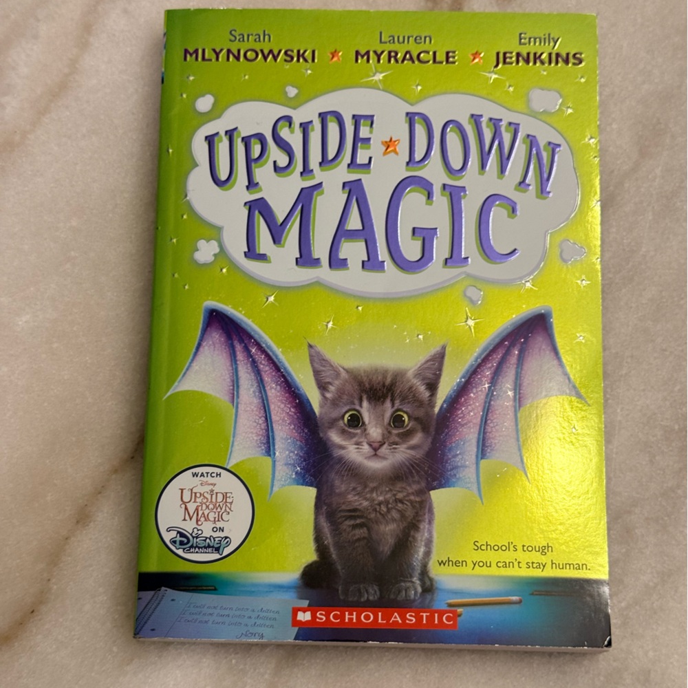 Scholastic Upside Down Magic Book with Green and Purple Cover